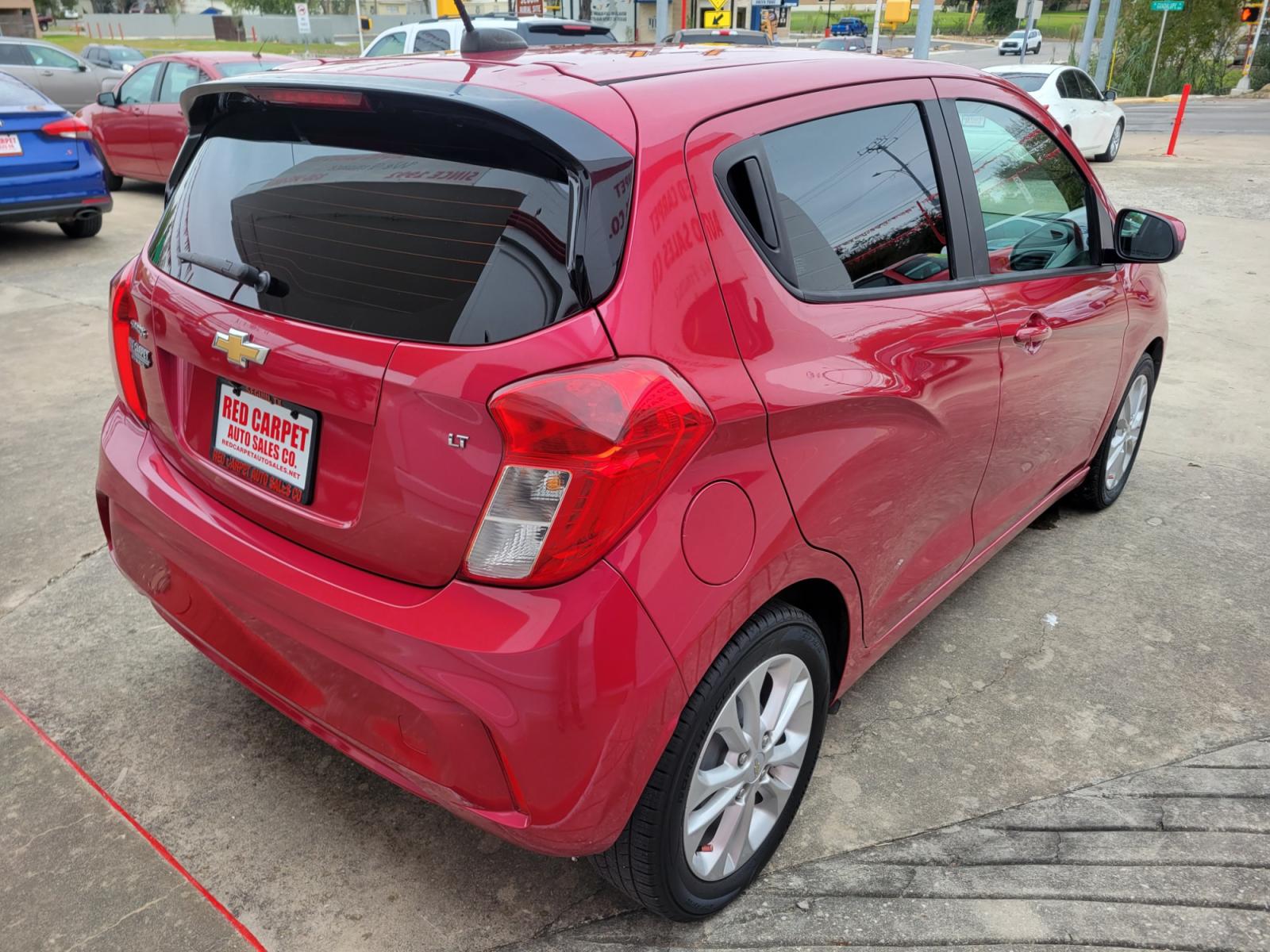 2020 Red Chevrolet Spark 1LT Manual (KL8CC6SA6LC) with an 1.4L L4 16V DOHC engine, 5 Speed Manual transmission, located at 503 West Court, Seguin, TX, 78155, (830) 379-3373, 29.568621, -97.969803 - 2020 Chevrolet Spark 1LT Manual with a 1.4L L4 16V DOHC, Standard Transmission, Tilt, Cruise, AM/FM Touchscreen Stereo, Power Windows, Locks and Side Mirrors, Bluetooth, Automatic Headlights, Tinted Windows, Alloy Wheels, Rear Wiper, Rear Defroster and more!! - Photo #2